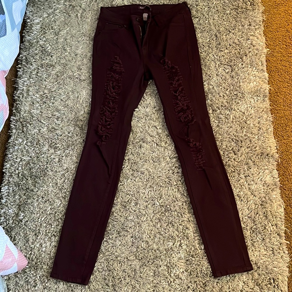 NEVER WORN RIPPED BURGUNDY SKINNY JEANS!
